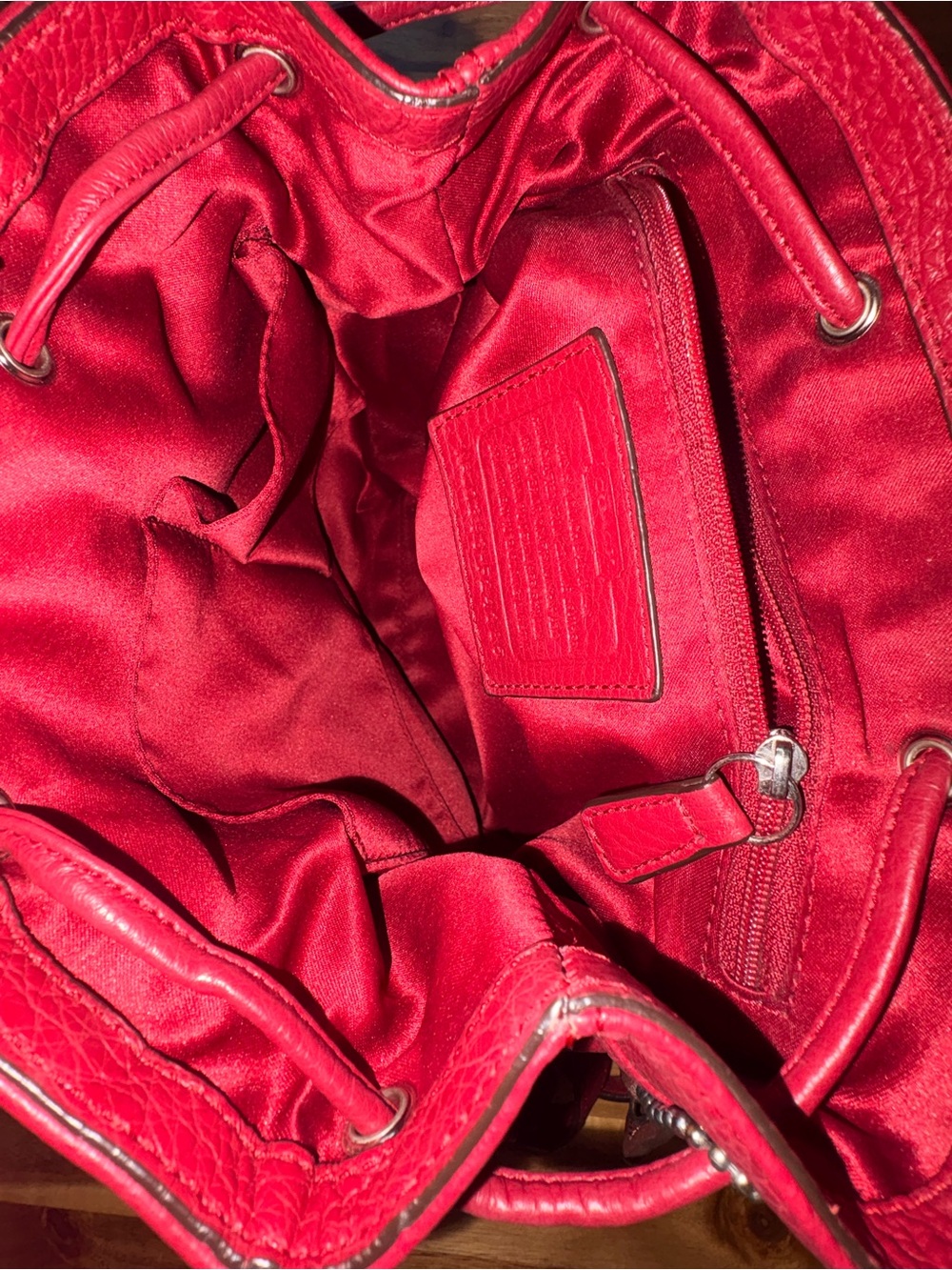 Coach Pebbled Leather Drawstring Backpack in Raspberry - Picture 9 of 13
